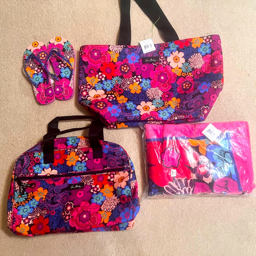 Sets of  traveling beach sets towel flip flop tote and duffel bag.